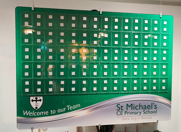 Welcome to our team staff photo board with green design and printed logo